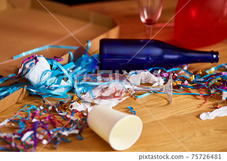 Messy wooden table at morning after party. 75726481