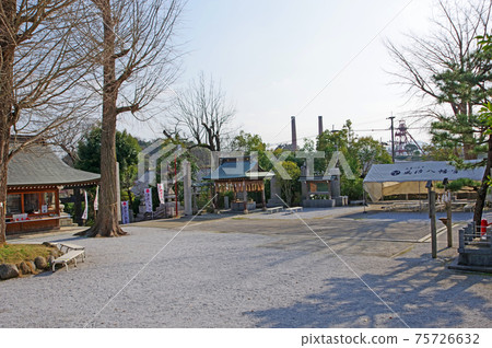 A distant view of two chimneys from the precincts of Fujihachimangu in Tagawa City, Fukuoka Prefecture 75726632