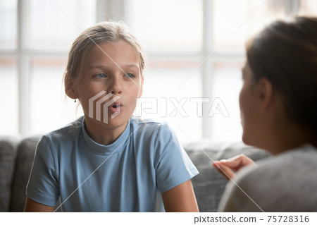 Teen girl child learn pronunciation with tutor 75728316