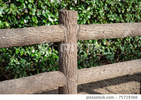 The installed concrete artificial wooden fence from diagonally left front The installed concrete artificial wooden fence from diagonally left front 75729366