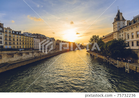 Court of Cassation of france in paris and left bank of seine river at dusk 75732236