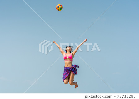 Portrait of woman posing outdoors at the sea beach Portrait of woman posing outdoors at the sea beach 75733293