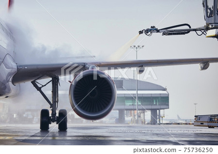 Deicing of airplane before flight Deicing of airplane before flight 75736250