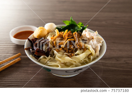Malaysia hawker food - Pan Mee is made with a simple flour-based dough with anchovy broth 75737180
