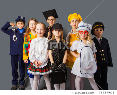 Little kids dressing up as professions. Future education 75737601