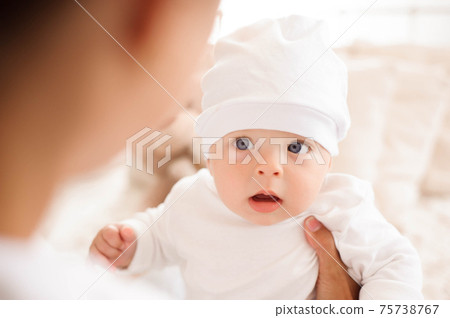 Mother, playing with her toddler boy smiling 75738767