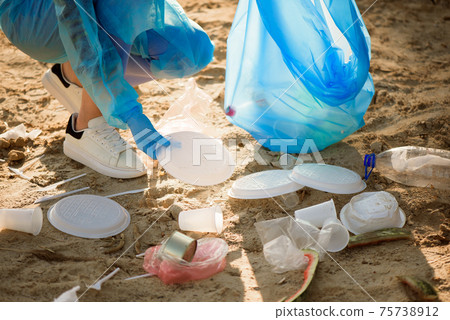 Trash keeper or garbage on the beach. Trash keeper or garbage on the beach. 75738912