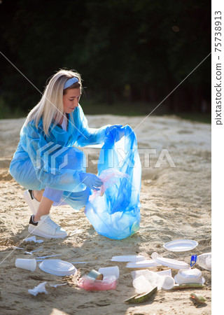 Trash keeper or garbage on the beach. Trash keeper or garbage on the beach. 75738913