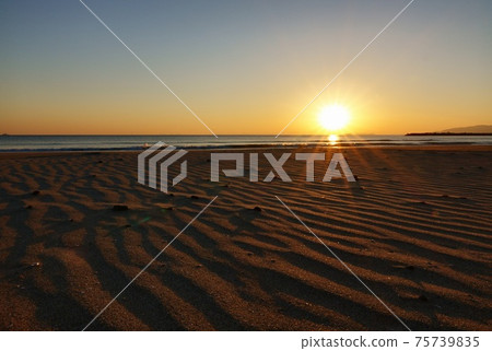 Sandy beach at dusk Sandy beach at dusk 75739835