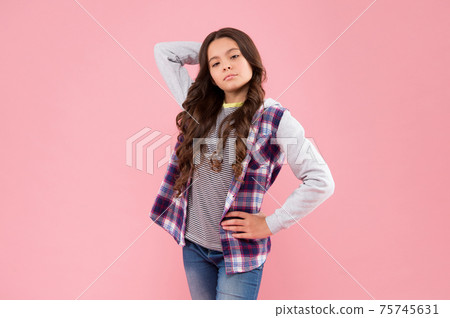 Choosing trendy clothes perfect for her style. Little kid Choosing trendy clothes perfect for her style. Little kid 75745631