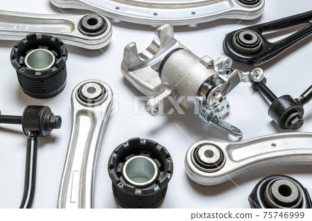Car inspection. Auto motor mechanic spare or automotive piece on white background. Set of new metal car part. Automobile engine service. 75746999