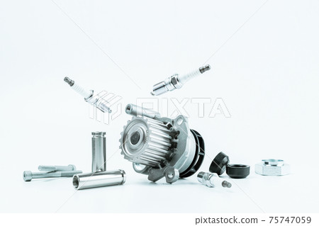 Car accessories. Set of new metal car part. Auto motor mechanic spare or automotive piece isolated on white background. Repair and vehicle service. Car accessories. Set of new metal car part. Auto motor mechanic spare or automotive piece isolated on white background. Repair and vehicle service. 75747059