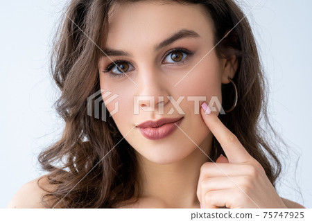 beauty enhancement woman touching face cheek skin beauty enhancement woman touching face cheek skin 75747925