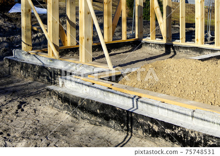 new wooden house frame concrete foundation waterproofing and damp proofing with bitumen membrane 75748531