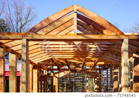 modern construction with wooden details, the new building are built environmentally friendly 75748545