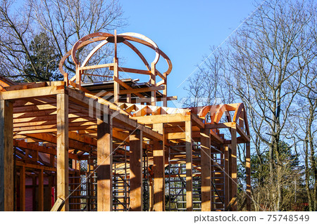 new wooden building frame with a round domed tower new wooden building frame with a round domed tower 75748549