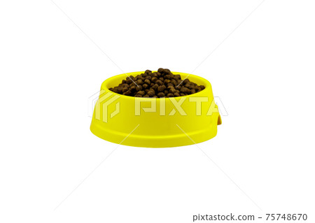 Dry food for cat or dog in a bowl. Pet food isolated on white background Dry food for cat or dog in a bowl. Pet food isolated on white background 75748670