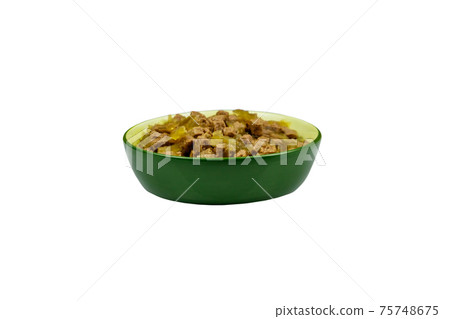 Canned food for cats or dogs in ceramic green bowl isolated on white background 75748675