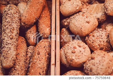 Fresh bread in bakery, organic food and gluten-free baking goods 75750648