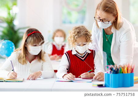 Kids in face mask. Child in school. Kids in face mask. Child in school. 75751758