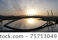 Sunrise over the bridge of the microbes 75753049