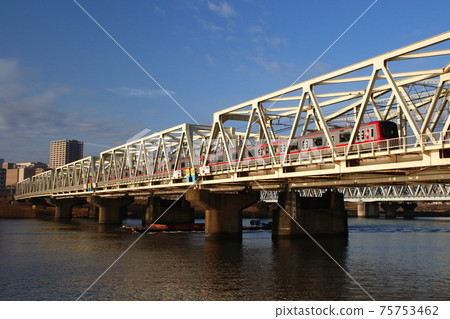 Tobu Isesaki Line: 70000 series train that crosses the Arakawa River and is directly connected to the Hibiya Subway Line 75753462