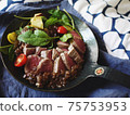 Roast beef made in a wild frying pan 75753953