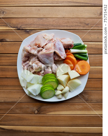 Raw chicken and vegetables, potatoes, carrots, onions, Korean food Dakbokkeumtang ingredients 75755432
