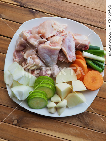Raw chicken and vegetables, potatoes, carrots, onions, Korean food Dakbokkeumtang ingredients 75755435