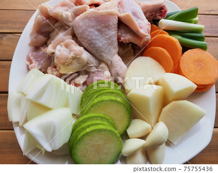 Raw chicken and vegetables, potatoes, carrots, onions, Korean food Dakbokkeumtang ingredients 75755436