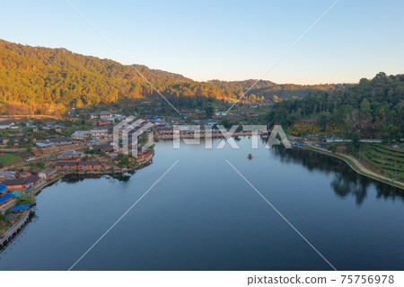 Aerial view of Ban Rak Thai village, chinese hotel resort, Mae Hong Son, Thailand. Nature landscape in travel trip and vacation. 75756978