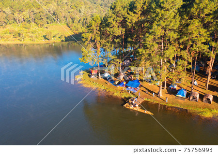 Aerial view of lakeside reservoir camping tents area, nature environment landscape. Pang Ung, Mae Hon Son, Northern, Thailand. National park. Aerial view of lakeside reservoir camping tents area, nature environment landscape. Pang Ung, Mae Hon Son, Northern, Thailand. National park. 75756993