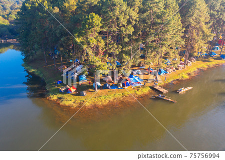 Aerial view of lakeside reservoir camping tents area, nature environment landscape. Pang Ung, Mae Hon Son, Northern, Thailand. National park. Aerial view of lakeside reservoir camping tents area, nature environment landscape. Pang Ung, Mae Hon Son, Northern, Thailand. National park. 75756994