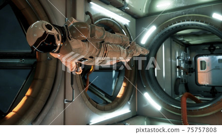 An astronaut in zero gravity checks the module of his spaceship. 3D Rendering. An astronaut in zero gravity checks the module of his spaceship. 3D Rendering. 75757808