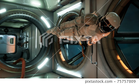 An astronaut in zero gravity checks the module of his spaceship. 3D Rendering. 75757809