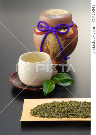 Tea leaves and tea Tea leaves and tea 75759042