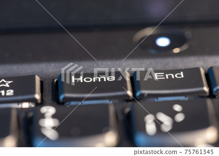Macro shot of black keyboard focus on home and end keys Macro shot of black keyboard focus on home and end keys 75761345