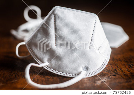 KN95 respirator mask for coronavirus protection. Face mask protects against covid-19 infection. 75762436