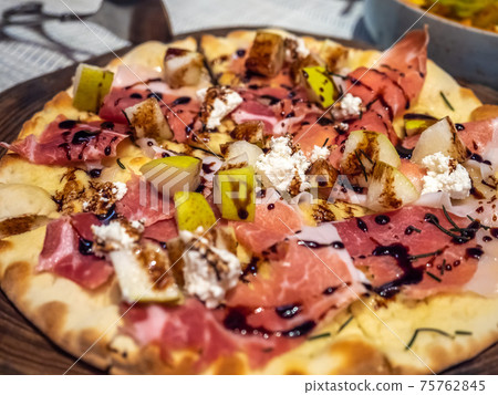 Flatbreads fresh from oven in Mediterranean style restaurant Flatbreads fresh from oven in Mediterranean style restaurant 75762845