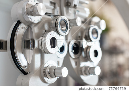 Close up of phoropter eyesight measurement testing machine. 75764739