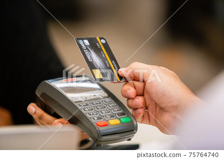 Credit card payment with POS terminal, Money payment shopping online in store. Credit card payment with POS terminal, Money payment shopping online in store. 75764740