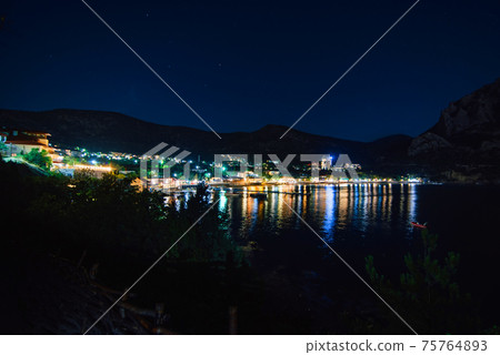 resort town of Novyy Svet in Crimea on Black Sea in night 75764893