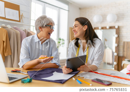 Women are working at workshop Women are working at workshop 75765831