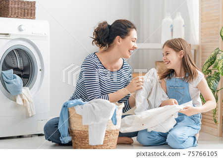 family doing laundry family doing laundry 75766105