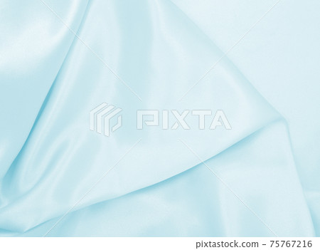 Smooth elegant blue silk or satin luxury cloth texture as abstract background. Luxurious background design 75767216