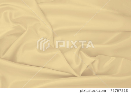 Smooth elegant golden silk or satin luxury cloth texture as wedding background. Luxurious background design. In Sepia toned. Retro style 75767218