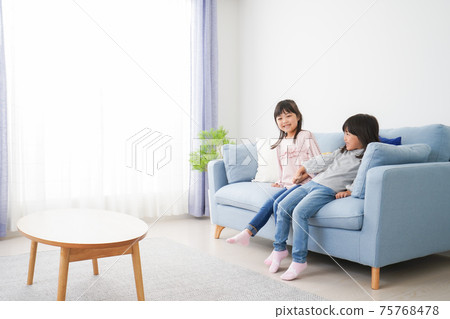 Girls playing at home Girls playing at home 75768478