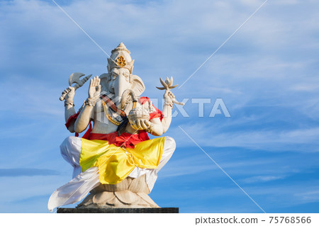 Ganesha sitting in meditating yoga pose  75768566