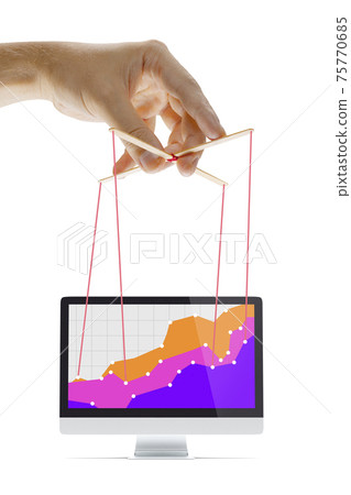 Businessman keeping the growth in economy, manipulating graphs like puppet 75770685