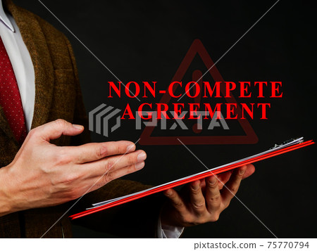 Non compete agreement or clause in the red folder. 75770794